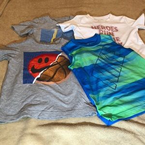 4 Nike size 4 shirts